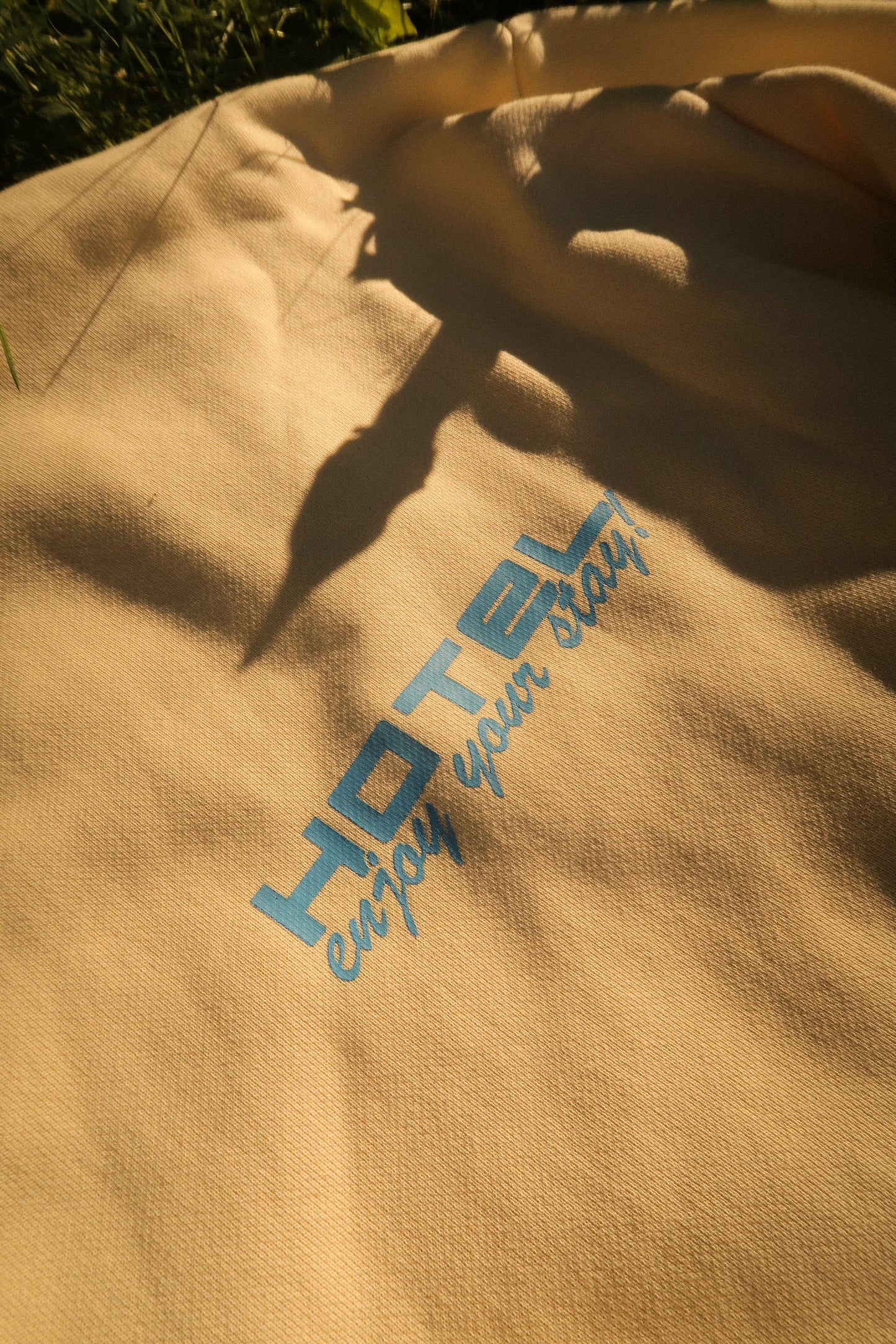 Hotel Trunk Slogan Crewneck
