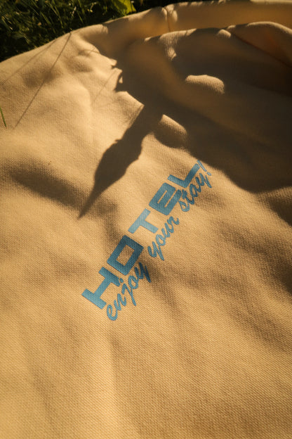 Hotel Trunk Slogan Crewneck