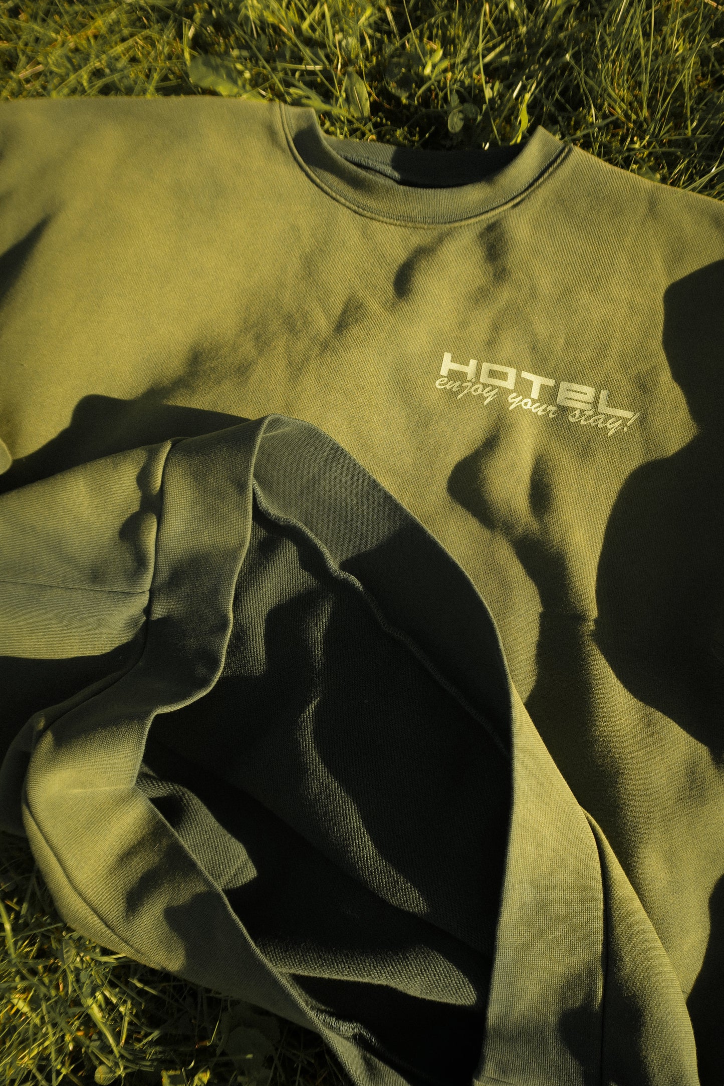 Hotel Trunk Slogan Crewneck
