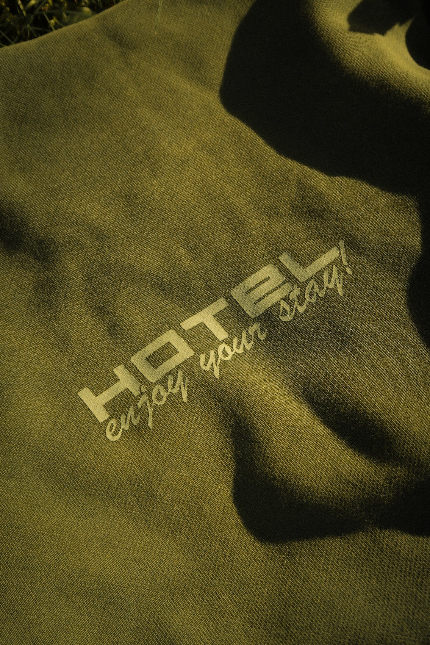 Hotel Trunk Slogan Crewneck